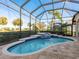 Enjoy this beautiful pool and spa with a waterfall feature at 7131 Sandhills Pl, Lakewood Ranch, FL 34202