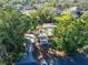 Housetop view of single story home with surrounding trees at 7705 Alhambra Dr, Bradenton, FL 34209