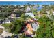 Aerial perspective showcasing a single-story house nestled among other homes at 7705 Alhambra Dr, Bradenton, FL 34209