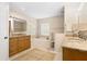 Double vanity bathroom with soaking tub and walk-in shower at 7705 Alhambra Dr, Bradenton, FL 34209