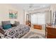 Well-lit bedroom with a daybed and large window at 7705 Alhambra Dr, Bradenton, FL 34209