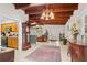 Bright entryway with high ceilings, hardwood floors, and views into the living areas at 7705 Alhambra Dr, Bradenton, FL 34209