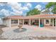 Courtyard patio with seating area, fountain and terracotta roof at 7705 Alhambra Dr, Bradenton, FL 34209