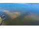 Aerial view of calm, shallow waters with navigational markers at 7705 Alhambra Dr, Bradenton, FL 34209