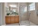 Bathroom with shower, vanity, and tiled floors at 9203 Winter Harbour Way, Bradenton, FL 34212