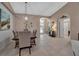 Spacious dining room with view of entryway and neutral color palette at 9203 Winter Harbour Way, Bradenton, FL 34212
