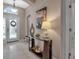 Bright and airy entryway with a console table and decorative mirror at 9203 Winter Harbour Way, Bradenton, FL 34212
