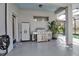 Outdoor kitchen area with grill and storage at 9203 Winter Harbour Way, Bradenton, FL 34212