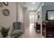 Elegant hallway with access to main bedroom and bathroom at 9203 Winter Harbour Way, Bradenton, FL 34212