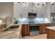 Modern kitchen with stainless steel appliances and granite countertops at 9203 Winter Harbour Way, Bradenton, FL 34212