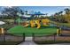 playground with various play equipment under a shaded canopy at 9203 Winter Harbour Way, Bradenton, FL 34212
