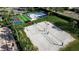 Two sand volleyball courts with nets and a bocce ball court nearby at 9203 Winter Harbour Way, Bradenton, FL 34212