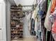 Large walk-in closet with ample shelving and hanging space at 9203 Winter Harbour Way, Bradenton, FL 34212