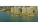 Aerial view of luxury waterfront condos with boat slips at 988 Blvd Of The Arts # 311, Sarasota, FL 34236
