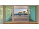 Balcony offers breathtaking views of the water and palm trees at 988 Blvd Of The Arts # 311, Sarasota, FL 34236