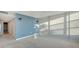 Bright bedroom with light walls and carpeted floor at 988 Blvd Of The Arts # 311, Sarasota, FL 34236