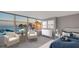 Bedroom with water views and stylish furnishings at 988 Blvd Of The Arts # 311, Sarasota, FL 34236