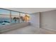Bedroom with stunning sunset water views at 988 Blvd Of The Arts # 311, Sarasota, FL 34236