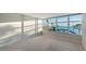 Bedroom with large windows and water views at 988 Blvd Of The Arts # 311, Sarasota, FL 34236