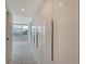 Hallway with built-in storage and view of ocean at 988 Blvd Of The Arts # 311, Sarasota, FL 34236