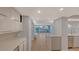 Modern kitchen with light cabinets, quartz countertops, and stainless steel appliances at 988 Blvd Of The Arts # 311, Sarasota, FL 34236
