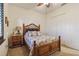 Cozy bedroom with wood bed frame and a charming nightstand at 1111 Socorro Dr, Punta Gorda, FL 33950