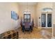 Formal dining room with a large table and chandelier at 1111 Socorro Dr, Punta Gorda, FL 33950