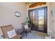Relaxing front porch with wicker chairs and welcoming decor at 1111 Socorro Dr, Punta Gorda, FL 33950