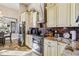 Spacious kitchen with granite countertops and stainless steel appliances at 1111 Socorro Dr, Punta Gorda, FL 33950