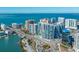 Aerial view of a modern high-rise building near the water at 1155 N Gulfstream Ave # 1406, Sarasota, FL 34236