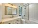 Simple bathroom with white tile, bathtub, and modern fixtures at 15125 Waterline Rd, Bradenton, FL 34212