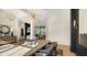 Bright dining room with a large wooden table and modern chandelier at 15125 Waterline Rd, Bradenton, FL 34212