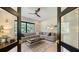 Spacious Gathering room featuring a comfortable sectional sofa and large windows at 15125 Waterline Rd, Bradenton, FL 34212