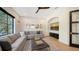 Gathering room boasts a sectional sofa and built-in entertainment center at 15125 Waterline Rd, Bradenton, FL 34212