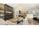 Elegant living room featuring a built-in entertainment center and hardwood floors at 15125 Waterline Rd, Bradenton, FL 34212