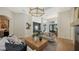 Light and airy living room with a large wooden coffee table and modern decor at 15125 Waterline Rd, Bradenton, FL 34212