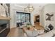Open living space with a large window overlooking pool and modern decor at 15125 Waterline Rd, Bradenton, FL 34212