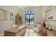 Sunlit office with large window, wood desk, and neutral decor at 15125 Waterline Rd, Bradenton, FL 34212