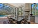 Outdoor kitchen with stainless steel appliances and dining area at 15125 Waterline Rd, Bradenton, FL 34212
