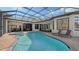 Resort-style pool and spa with covered lanai and plenty of seating at 15125 Waterline Rd, Bradenton, FL 34212