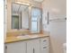 Clean bathroom with vanity and window at 1523 46Th E Ave, Ellenton, FL 34222