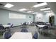Community room with tables and chairs, great for gatherings at 1523 46Th E Ave, Ellenton, FL 34222