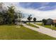 White gazebo near waterfront with split path leading to it at 1523 46Th E Ave, Ellenton, FL 34222