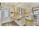Kitchen with light wood cabinets and appliances at 1523 46Th E Ave, Ellenton, FL 34222