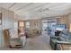 Spacious living room with access to covered patio at 1523 46Th E Ave, Ellenton, FL 34222