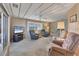 Living room with two armchairs, sofa, and TV at 1523 46Th E Ave, Ellenton, FL 34222