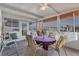 Cozy screened porch with table and chairs at 1523 46Th E Ave, Ellenton, FL 34222