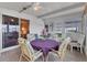 Screened porch with patio furniture and view at 1523 46Th E Ave, Ellenton, FL 34222