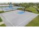 Full-size basketball court with markings and hoop at 17539 Polo Trl, Bradenton, FL 34211