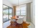Bright breakfast nook with sliding doors leading to the pool area at 17539 Polo Trl, Bradenton, FL 34211